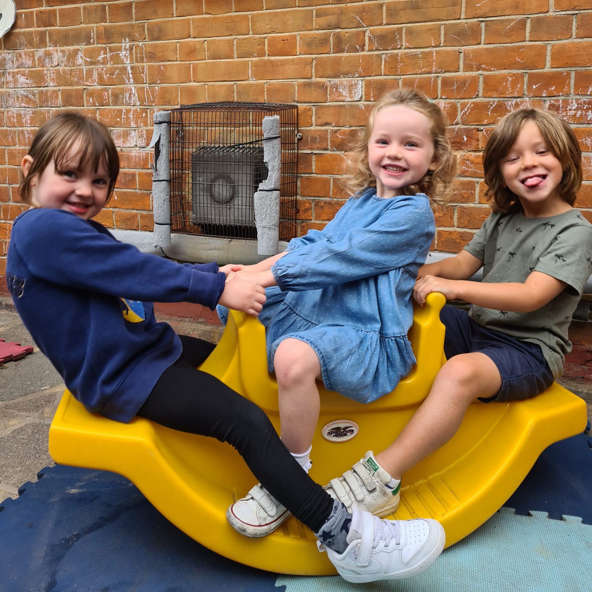 All smiles on the seesaw!